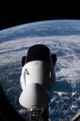 the spacex dragon cargo craft resupply ship docked to the space 