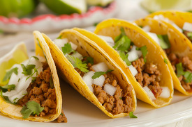 Traditional Mexican tacos with a sprinkle of fresh cilantro