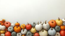 variety of pumpkins in different shapes and colors