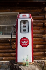 vintage gasoline station display at a tourist-cabin site in Sene