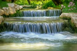 waterfall tumbles down a series of small ledges