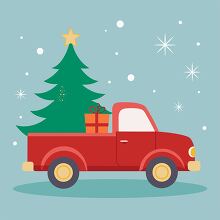 Red pickup truck carrying a decorated Christmas tree