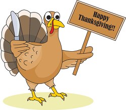 turkey holding happy thanksgiving sign