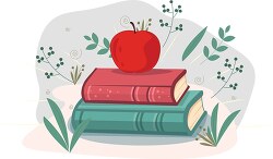 two books stacked with apple on top