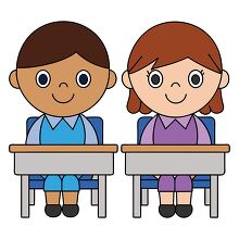 two students sitting at a desk ready for their lesson