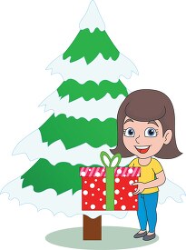 woman holding christmas gift near tree clipart clipart copy