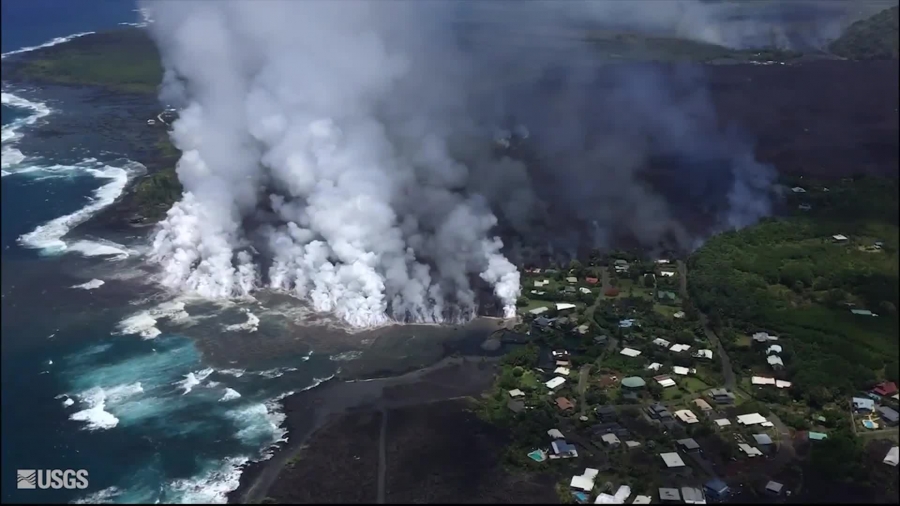 kapoho bay during a helicopter overflight lava entering ocean
