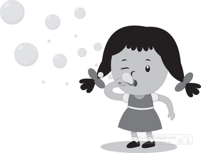 girl kid blowing bubbles holding wand to lips and blowing bubble