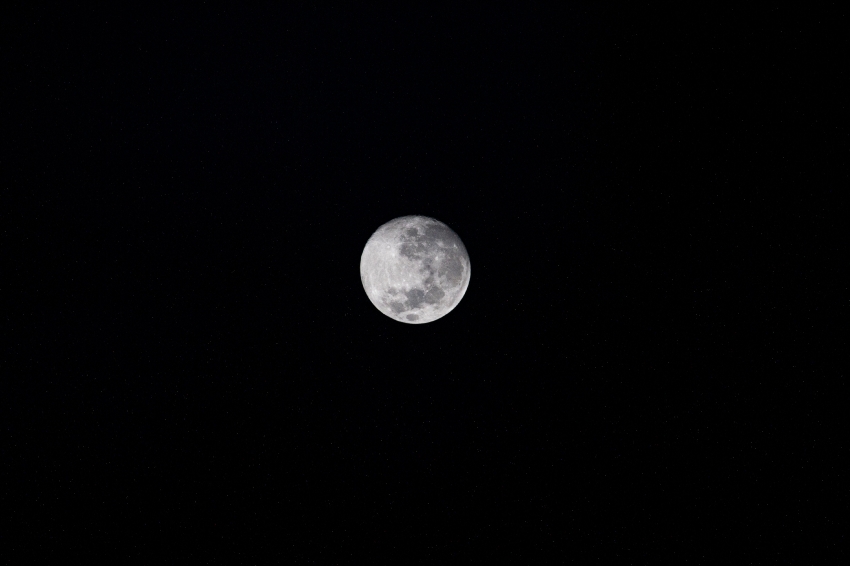 a waxing gibbous moon above north america