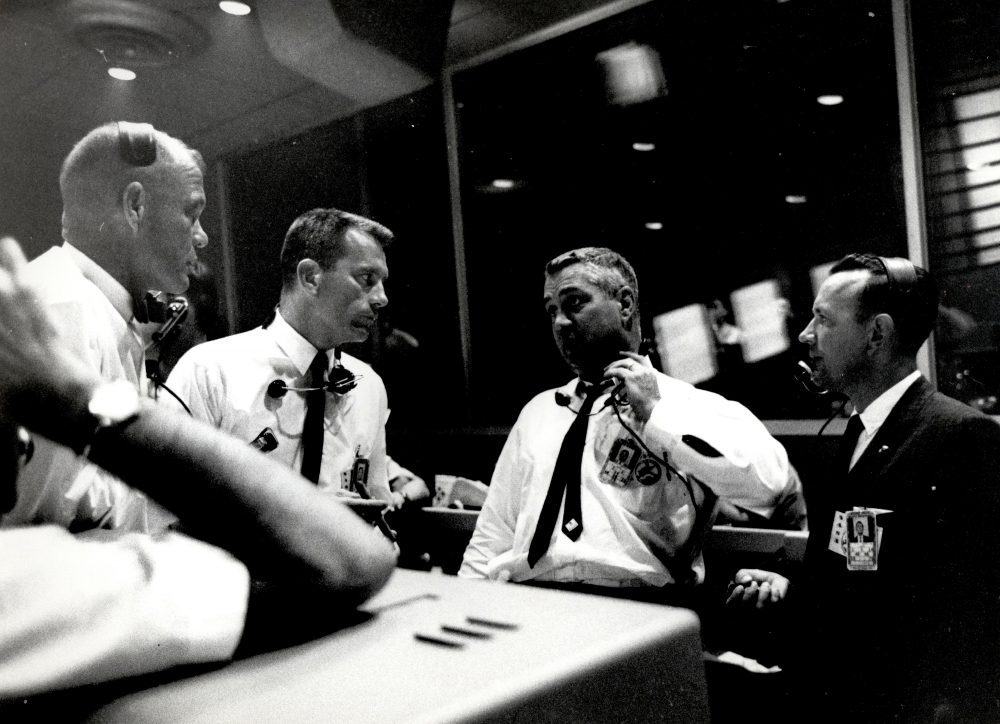 astronaut confer inside the Flight Control Area