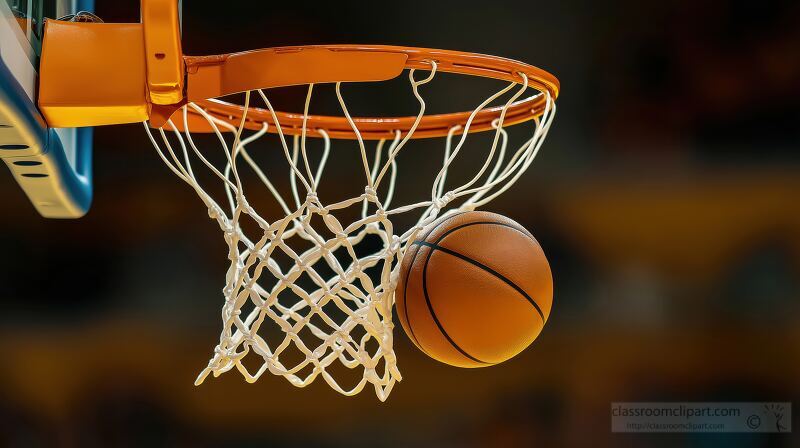 Basketball enters the hoop during an intense game in a packed ar