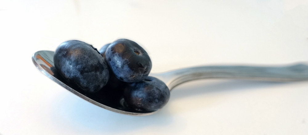 blueberries on spoon photo image