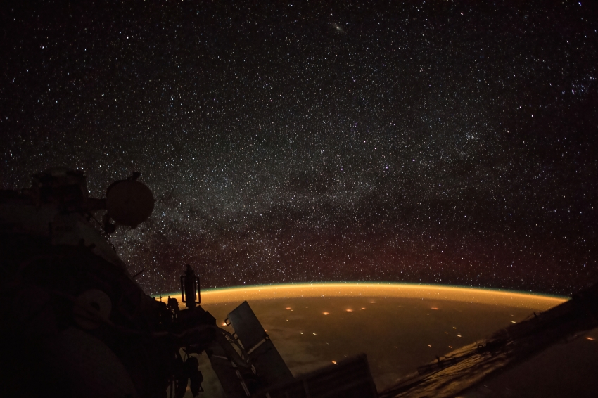 celestial view of earths atmospheric glow and the milky way