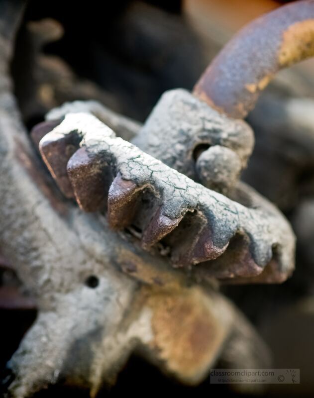 Close up of a rusty metal gear with detailed texture