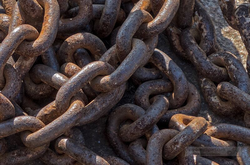 Close up of intertwined rusty metal chains