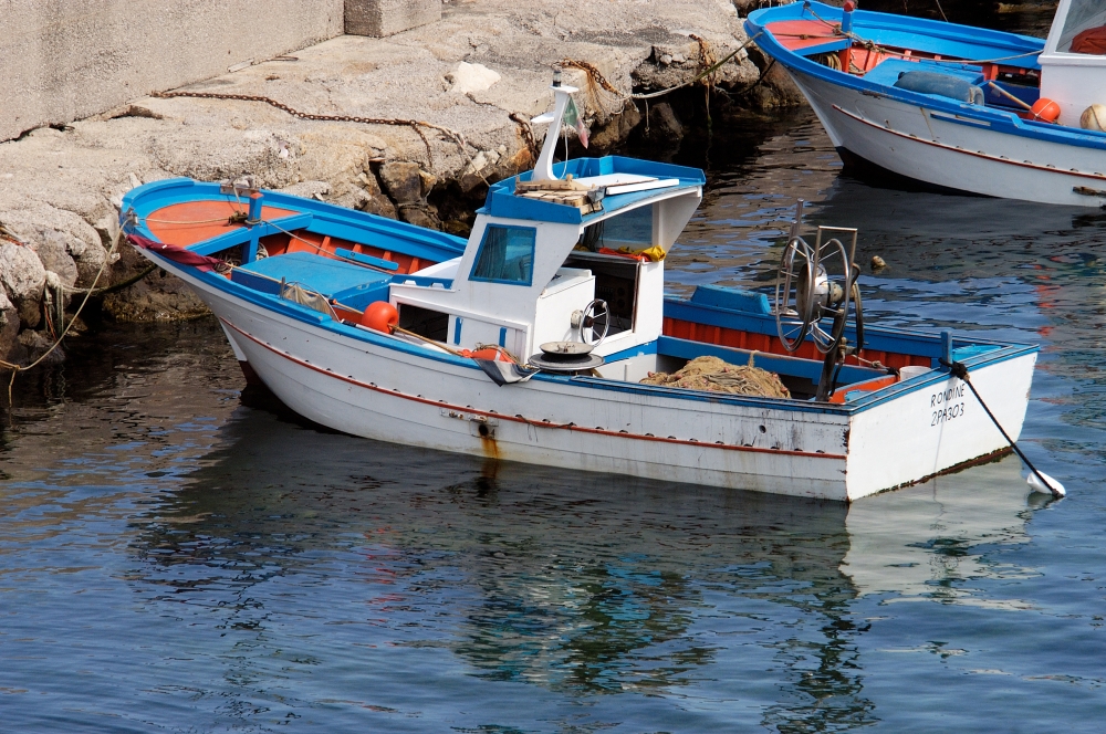 colorful blue and white fishing boat