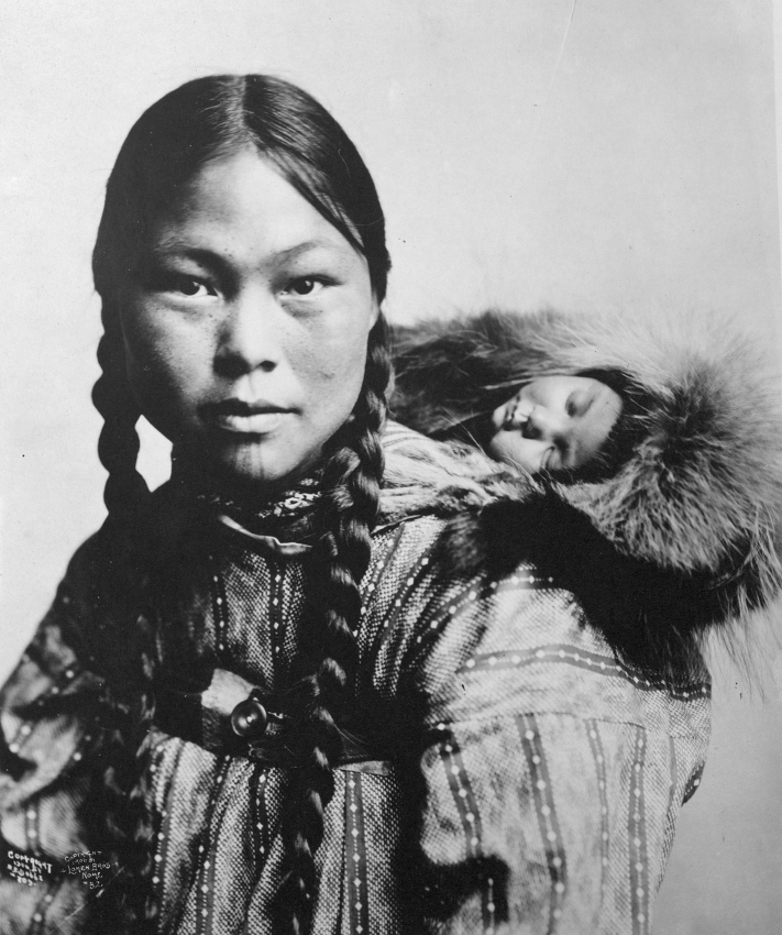 Alaska Photos-Eskimo mother with child on back Alaska historic photo
