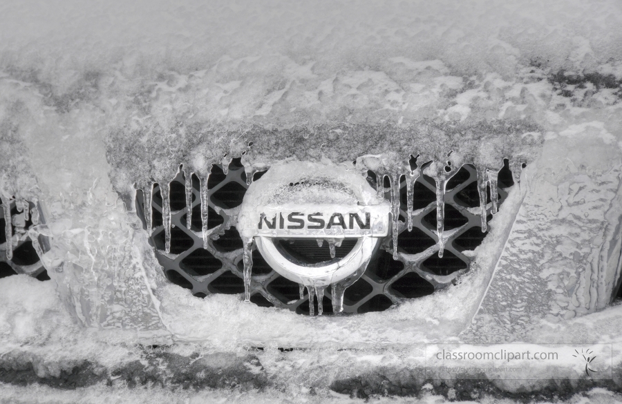 front of a car covered with snow and ice