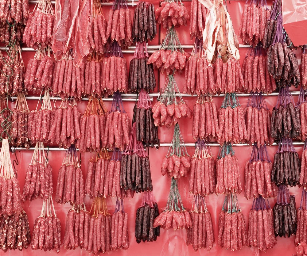 hanging dried meat for sale in stall china town singapore