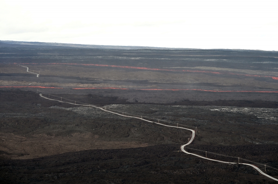 helicopter overflight shows a lava flow cutting across the Mauna