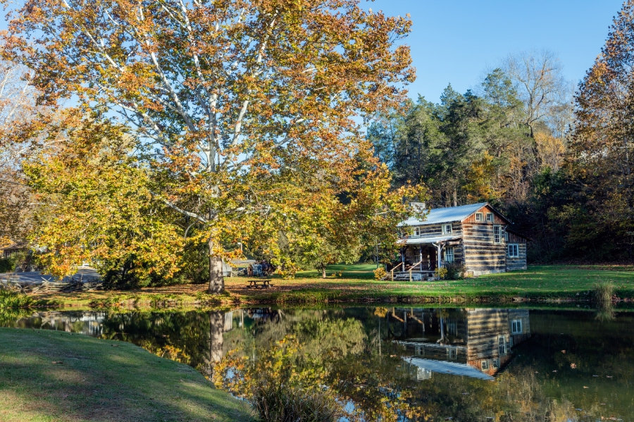 log house on the grounds of Cooks Old Mill