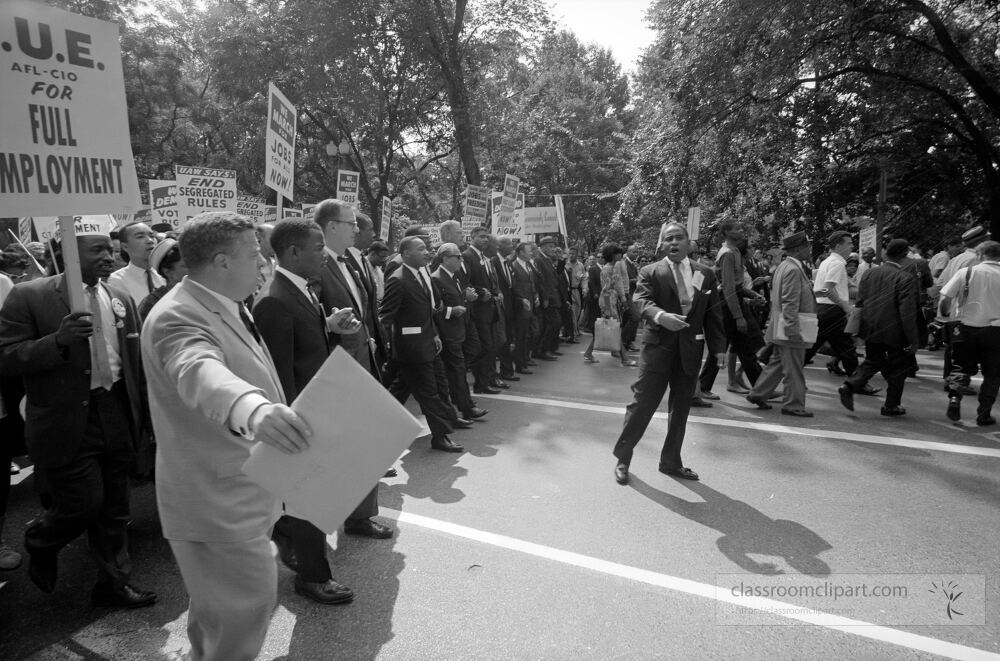 Marchers holds sign about Prince Edward County Virginia school