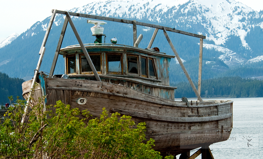 Old wooden boat along the shore Alaska