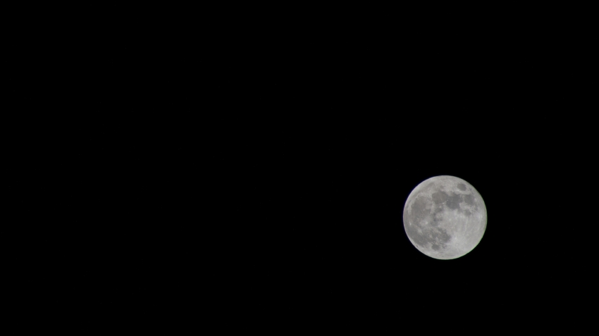 the full moon above the coast of tunisia