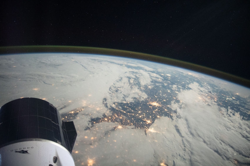 the spacex cargo dragon cargo craft above northern france