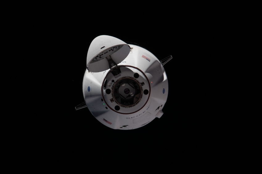 the spacex cargo dragon cargo craft approaches the space station