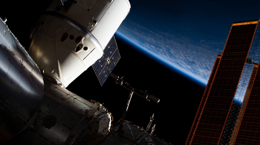 the spacex dragon cargo craft above alaskas aleutian islands in 