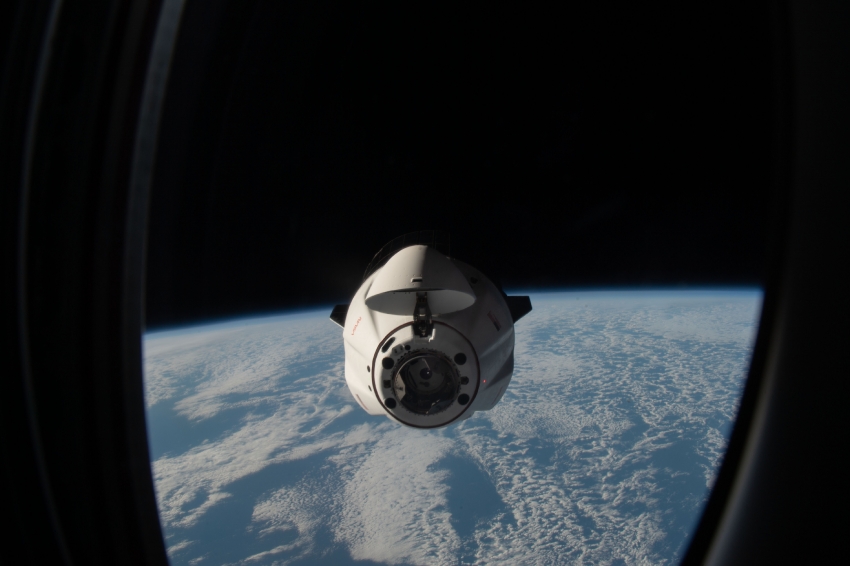 the spacex dragon cargo craft resupply ship approaches the space