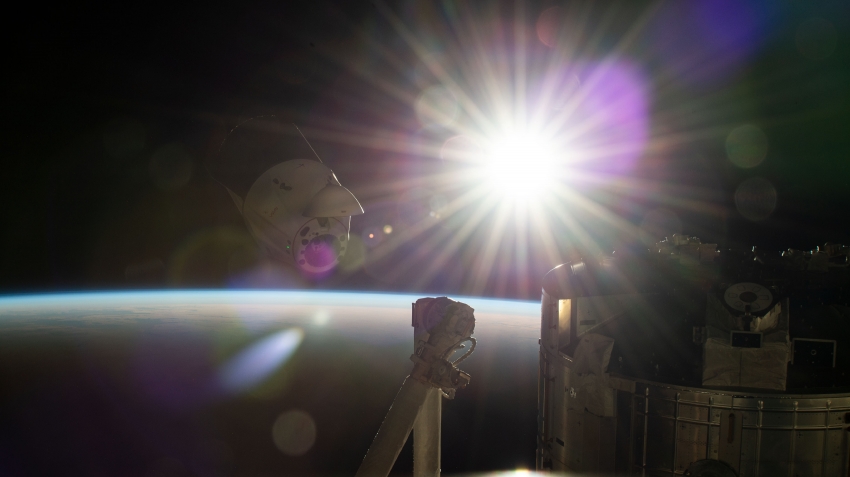 the spacex dragon cargo craft resupply ship backs away from the 