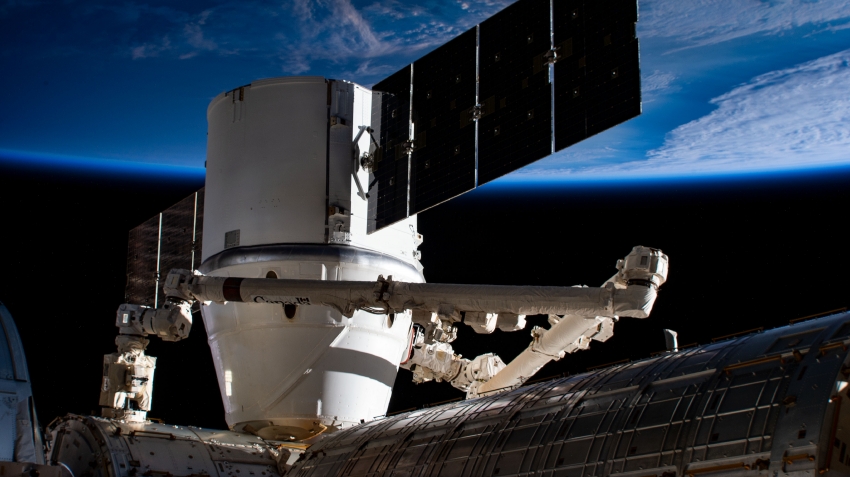 the spacex dragon cargo craft resupply ship berthed to the harmo
