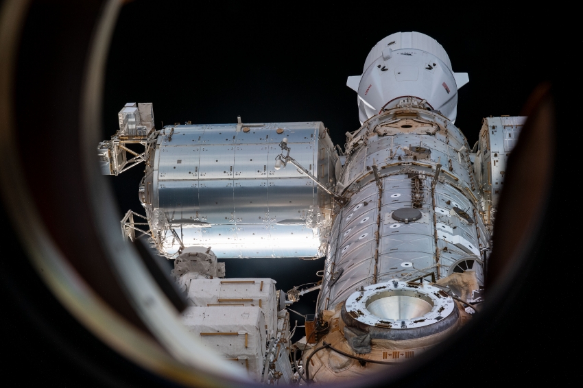 view of the station with the spacex dragon cargo craft cargo shi