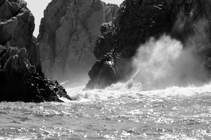 waves breaking black white photo cabo san lucas
