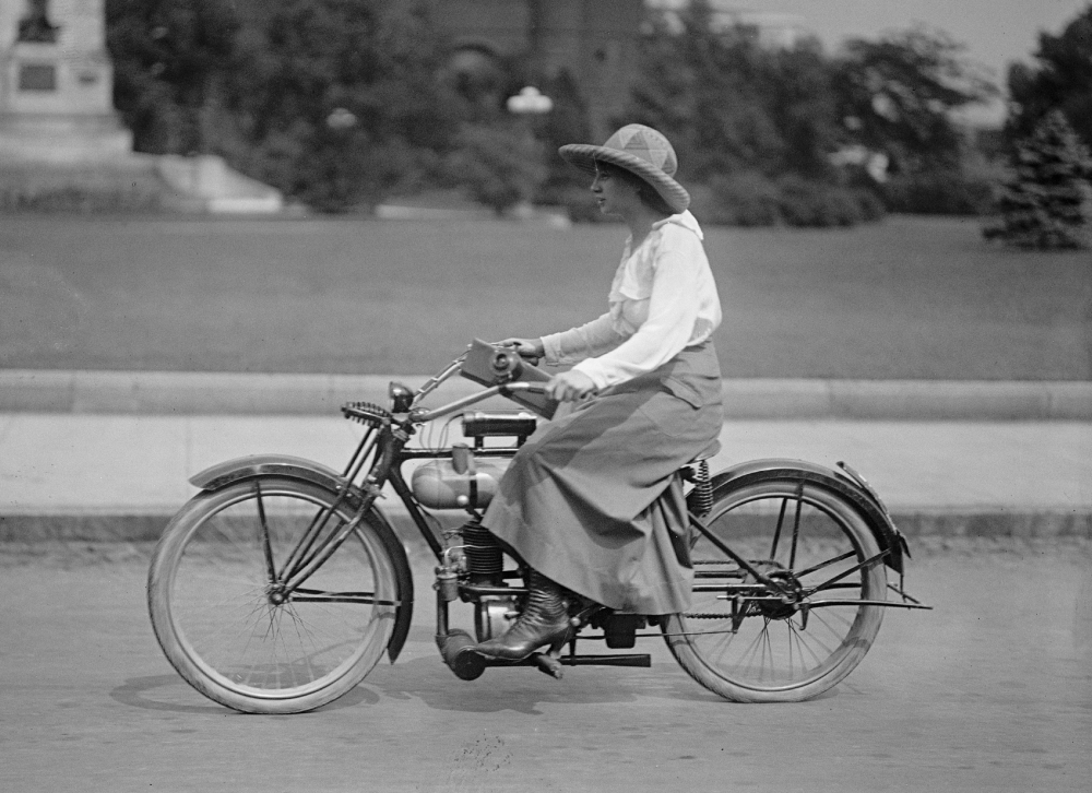 woman riding bicycle 1918
