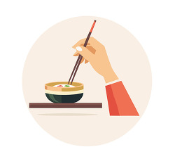 Hand Holding Chopsticks Over Bowl