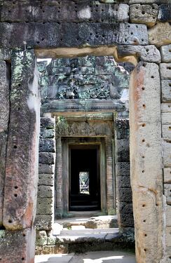 Explore Ancient Corridors of Angkor Wat in Cambodia