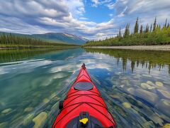 Kayaking on a Tranquil Yukon River With Stunning Reflections