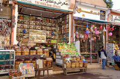 Market Stalls in Aswan Showcasing Local Spices and Crafts