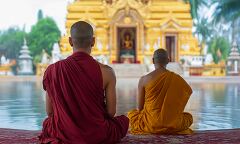 Monks in Quiet Meditation at a Temple in Myanmar