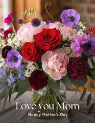 Mothers Day bouquet with red roses and purple flowers