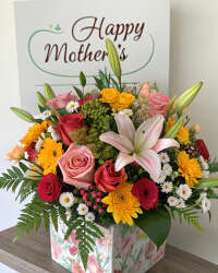 Mothers Day flower arrangement with lilies roses and daisies