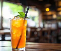 Refreshing Orange Soda Served at a Cozy Cafe