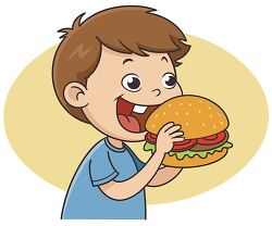 Smiling boy holding and eating a large hamburger