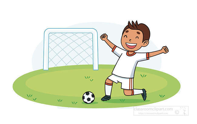 Boy kneeling with raised arms beside a soccer ball in front of a goal