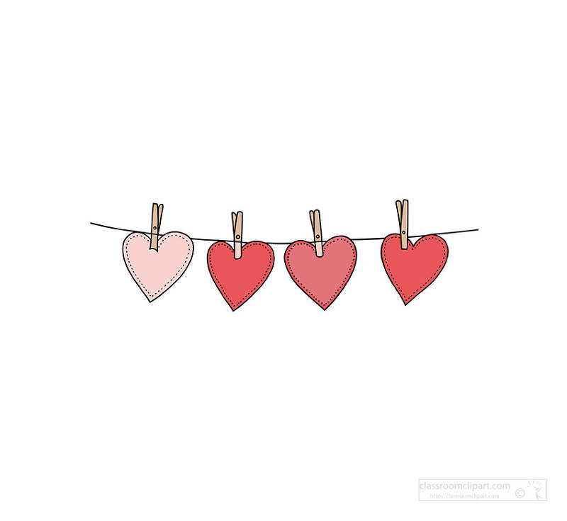 row of red and pink stitched hearts clipped to a string with wooden clothespins for romantic decoration