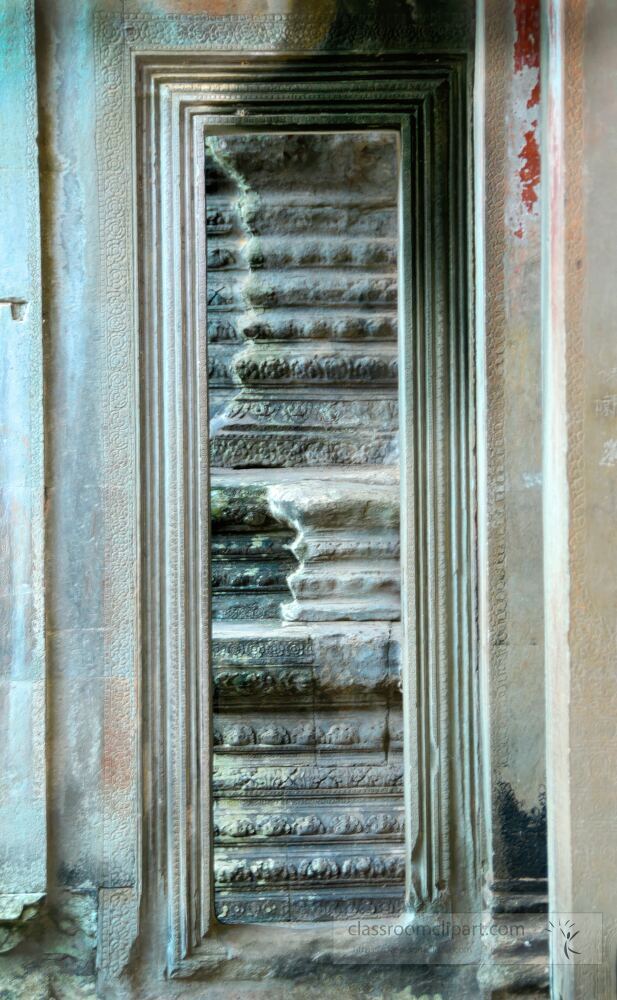 Discover the intricate details of an ancient doorway in Angkor Wat where history whispers through its weathered stone. Sunlight dances on the surfaces highlighting times passage in this remarkable location.