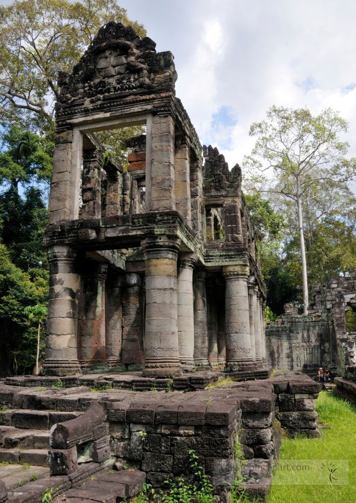 Exploring the majestic remnants of Angkor Wat in Siem Reap reveals intricate stone carvings and towering structures surrounded by lush greenery. The sunlight softly illuminates this historical treasure.